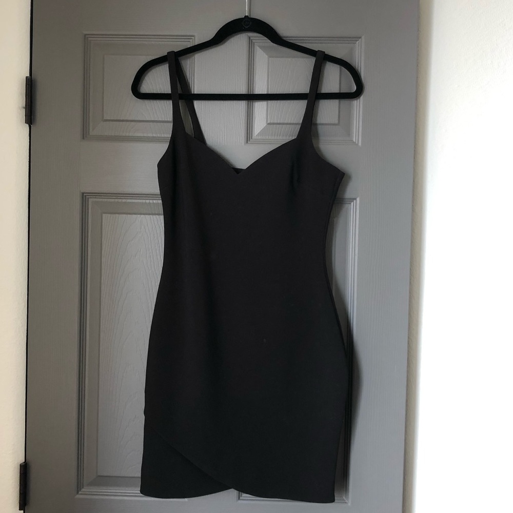 NWOT likely Black asymmetrical Fairbanks mini sz 4